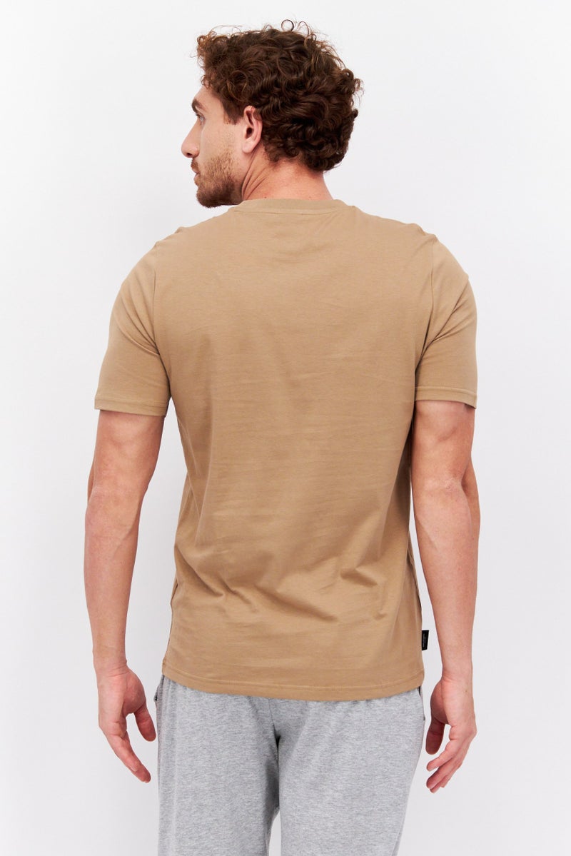 PUMA Men Sportswear Fit Short Sleeves Outdoor T-shirt, Tan - Image 4